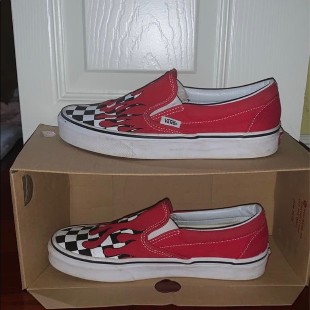 red flame checkerboard slip on vans